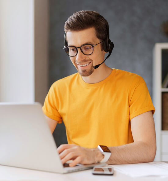 An Adamas agent handling a call on a headset